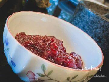 raspberry jam in bowl on slant