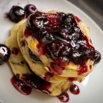 blueberries on a plate on a slant