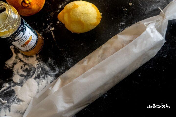citrus roly poly spotted dick wrapped in greaserproof paper