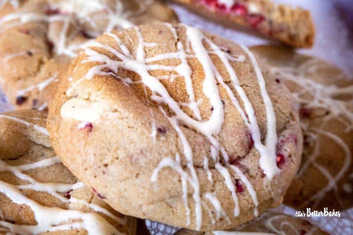 close up of single raspberry and white chocolate cookier