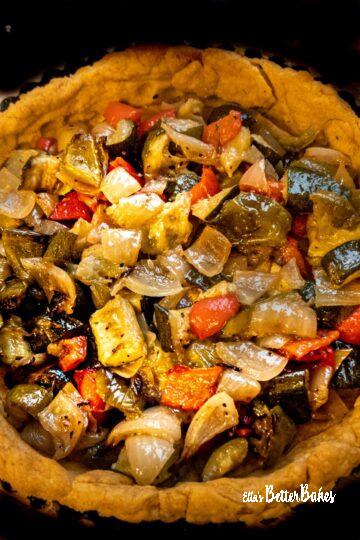 roasted veg added to pastry case