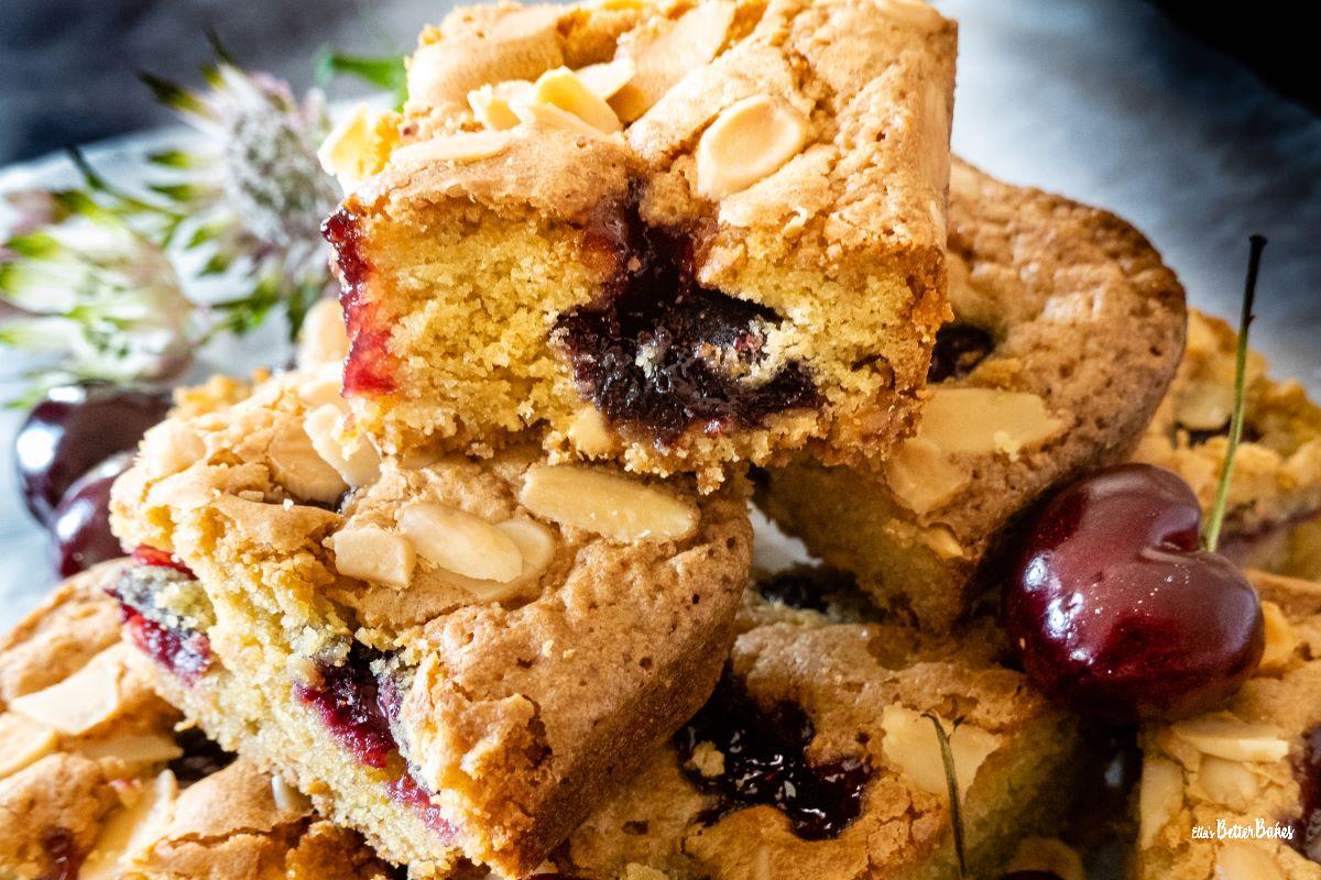 cherry bakewells together with flowers behind