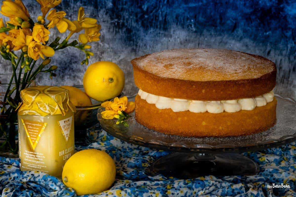 lemon victoria sponge on a cake stand