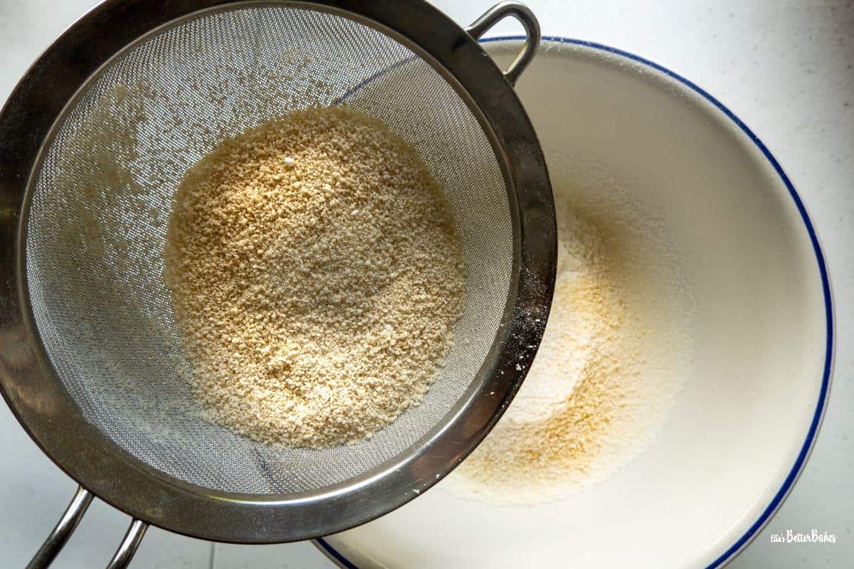 Almond flour being sieved for earl grey macarons