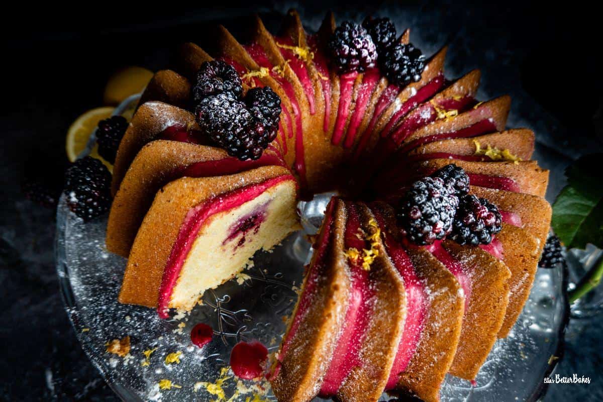lemon and blackberry bundt cake on cake stand 2