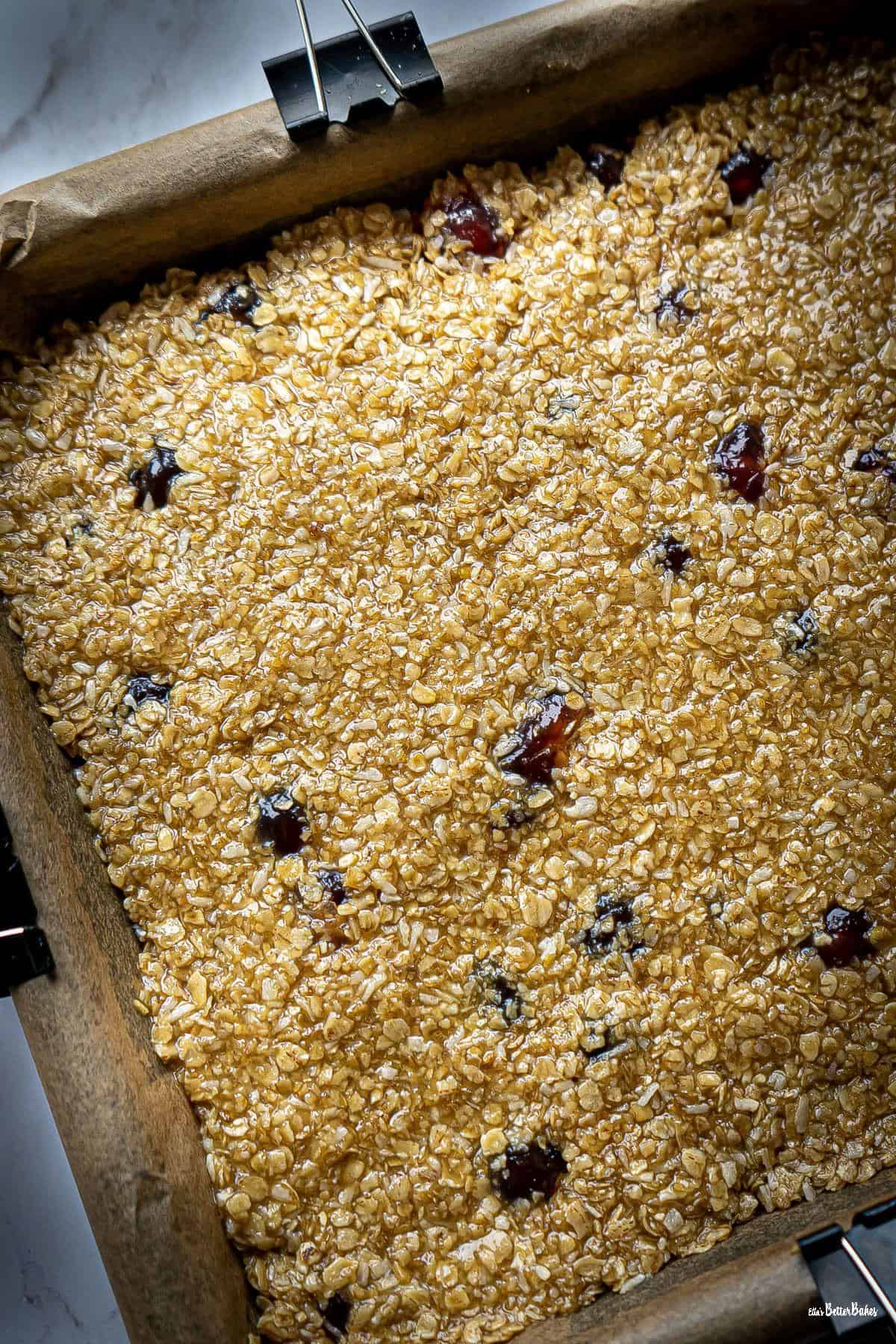 portrait size cherry flapjack mixture in tin