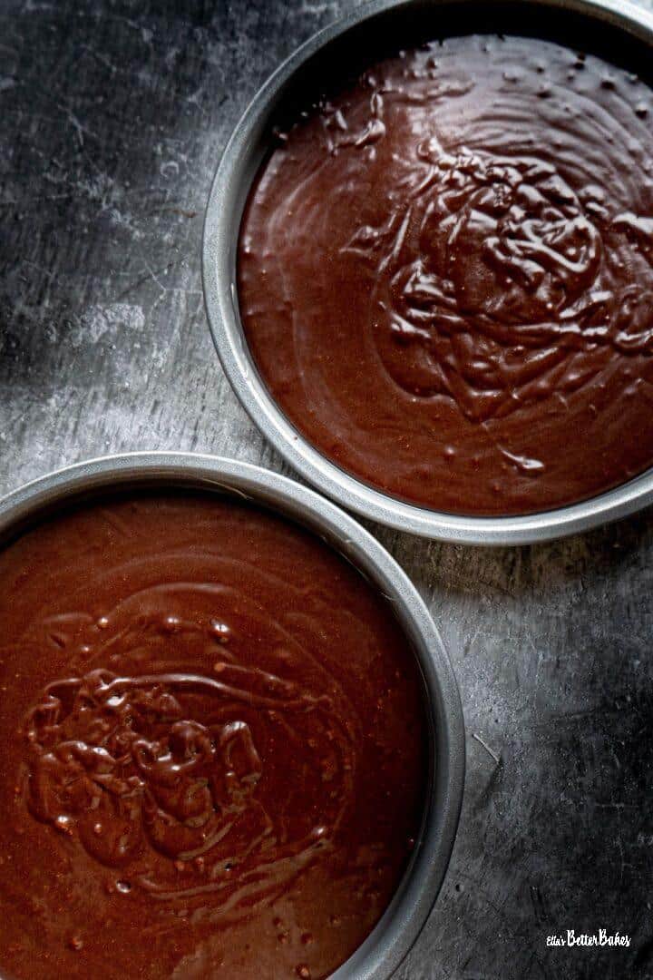 chocolate cake batter in tins