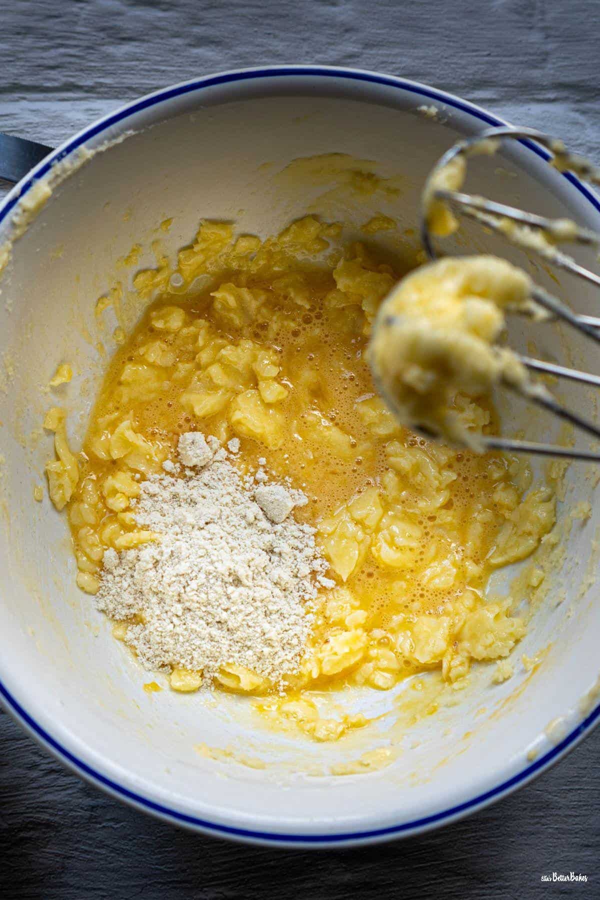egg and flour added to creamed butter and sugar