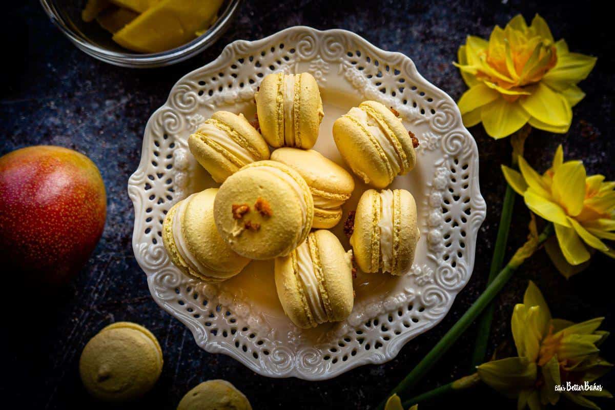 top shot of plate of mango macarons