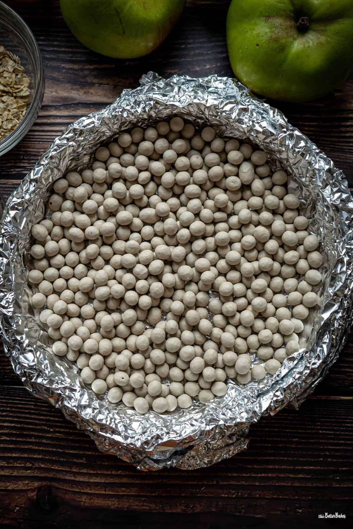 baking beans in foil in pastry case
