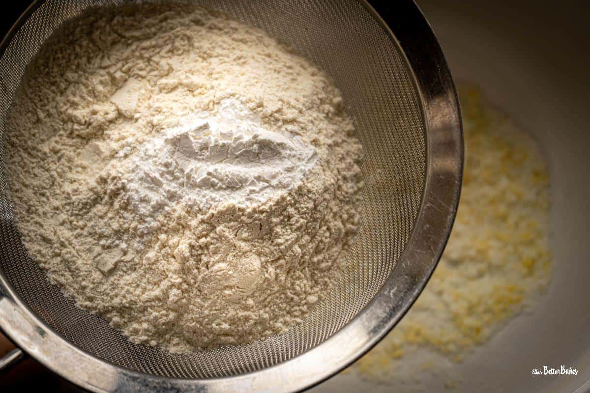 flour sifted into sugar and lemon zest