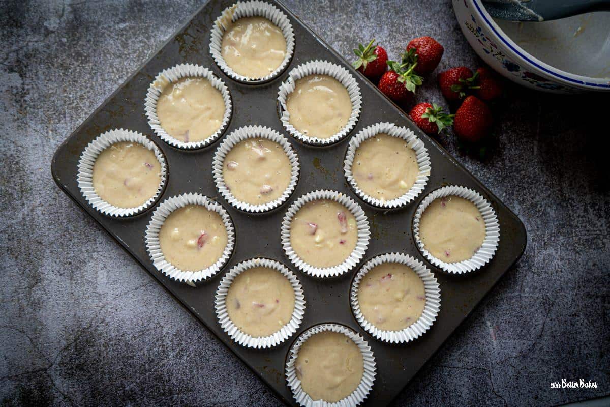 muffin batter in muffin cases