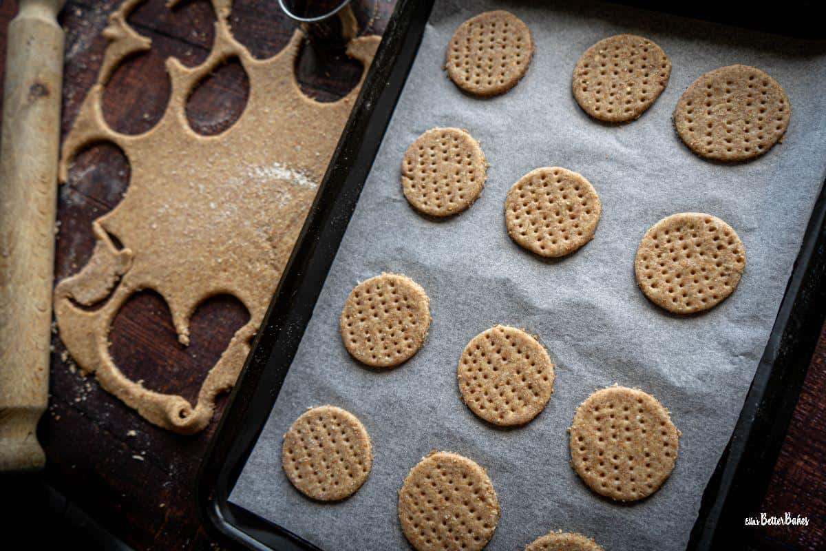 digestive biscuits on a baking sheet ready to bake