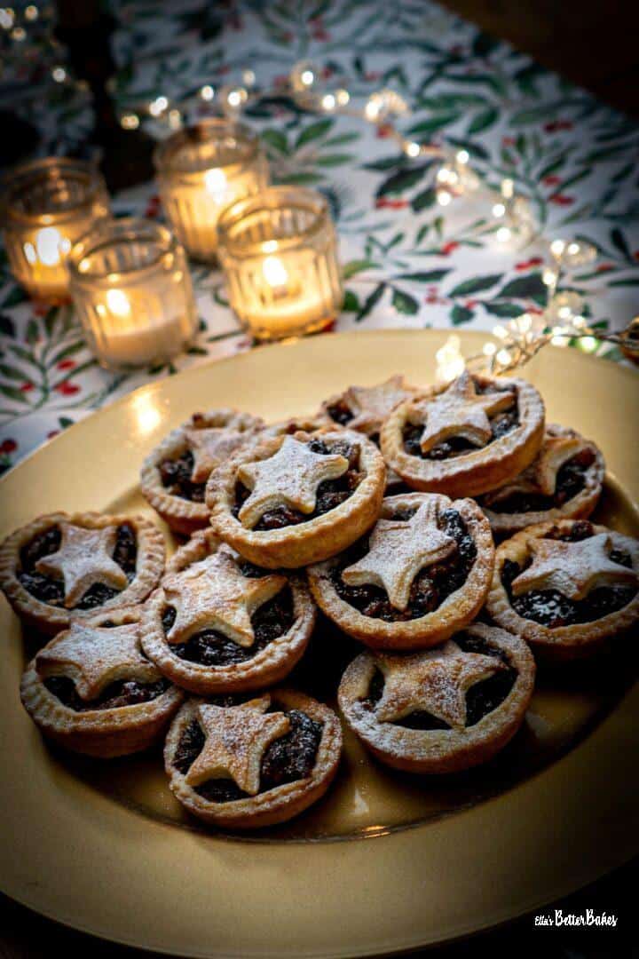 portrait size picture of plate of mince pies on table runner