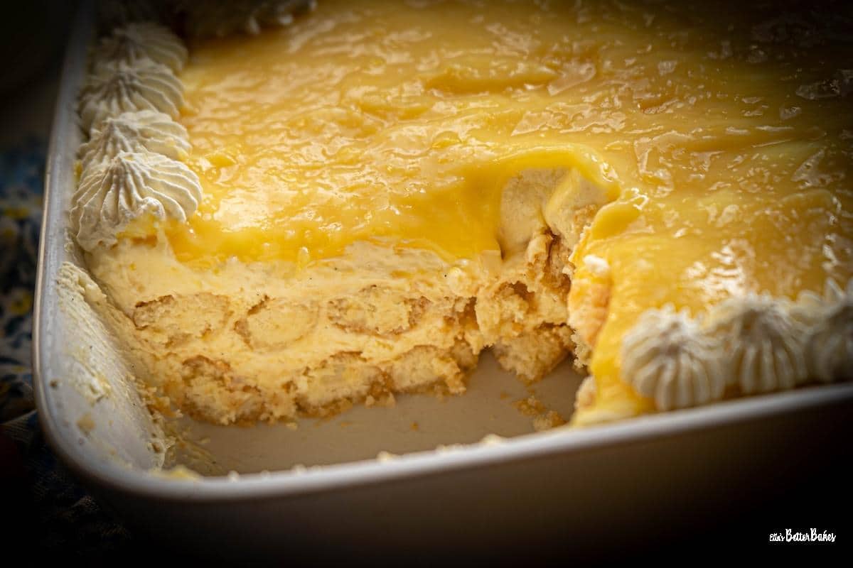 lemon tiramisu showing a piece cut out
