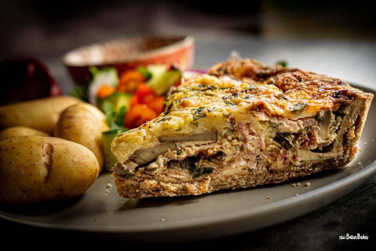 piece of bacon and mushroom quiche cut