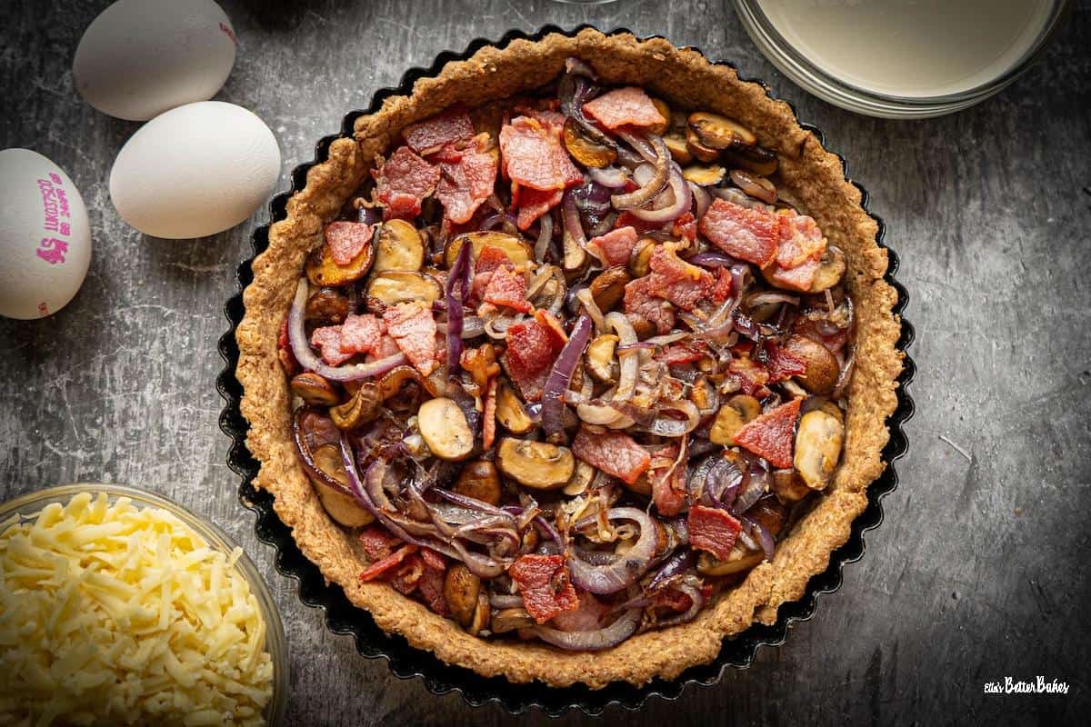 bacon, onions and mushrooms added to baked pastry case