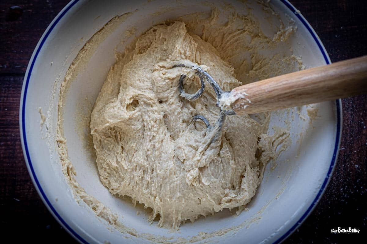 muffin dough mixed with dough whisk