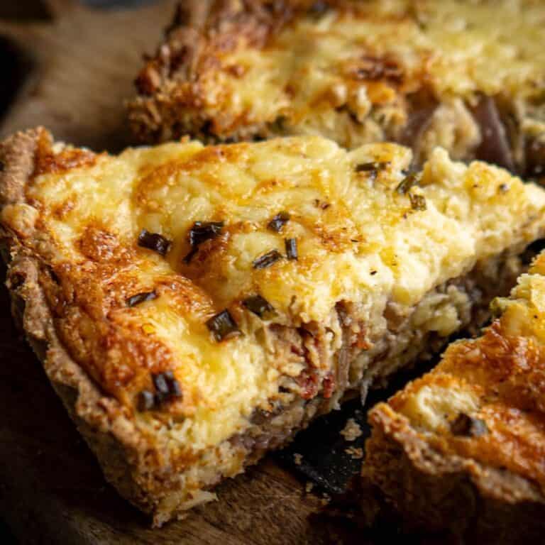 piece of bacon and mushroom quiche cut