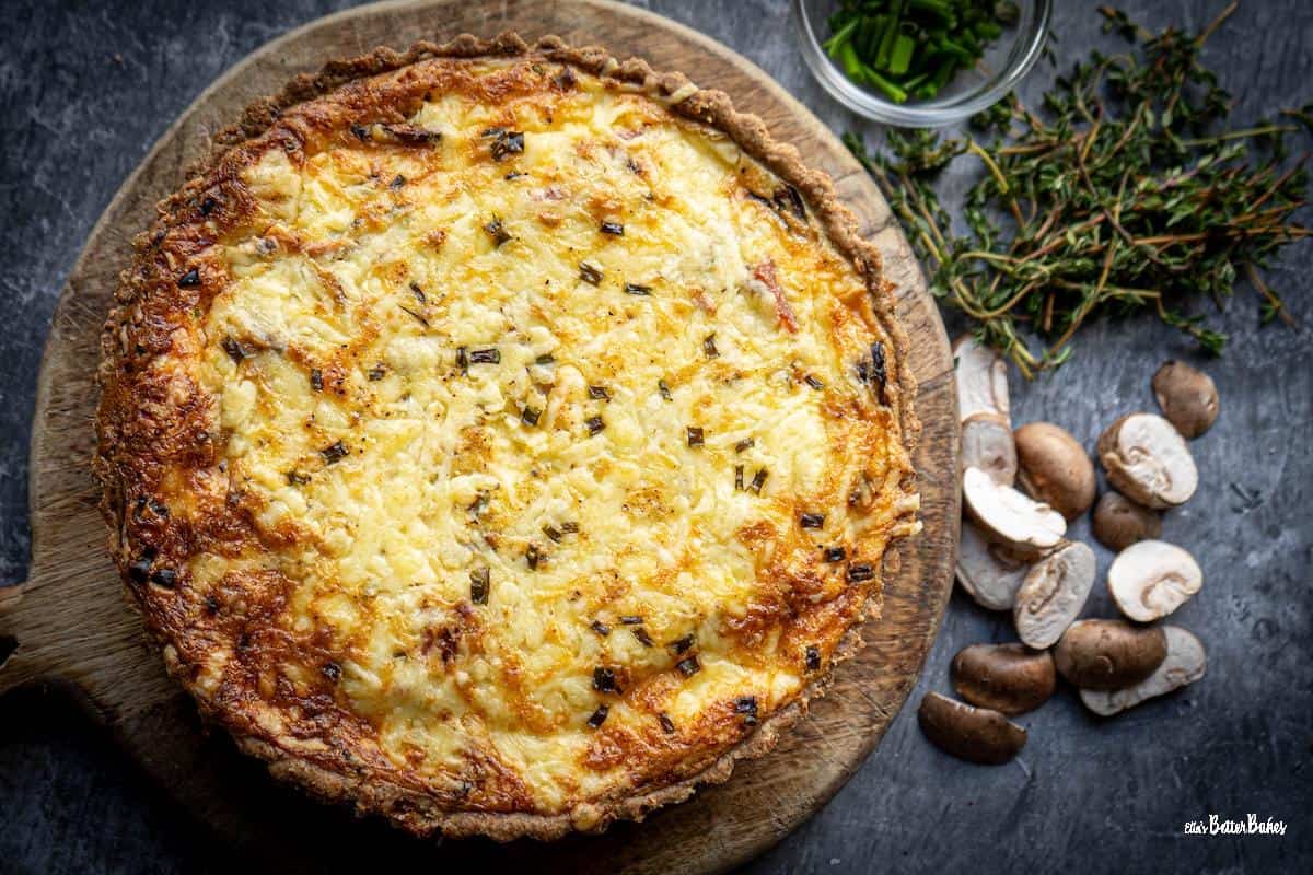 quiche baked and on a chopping board
