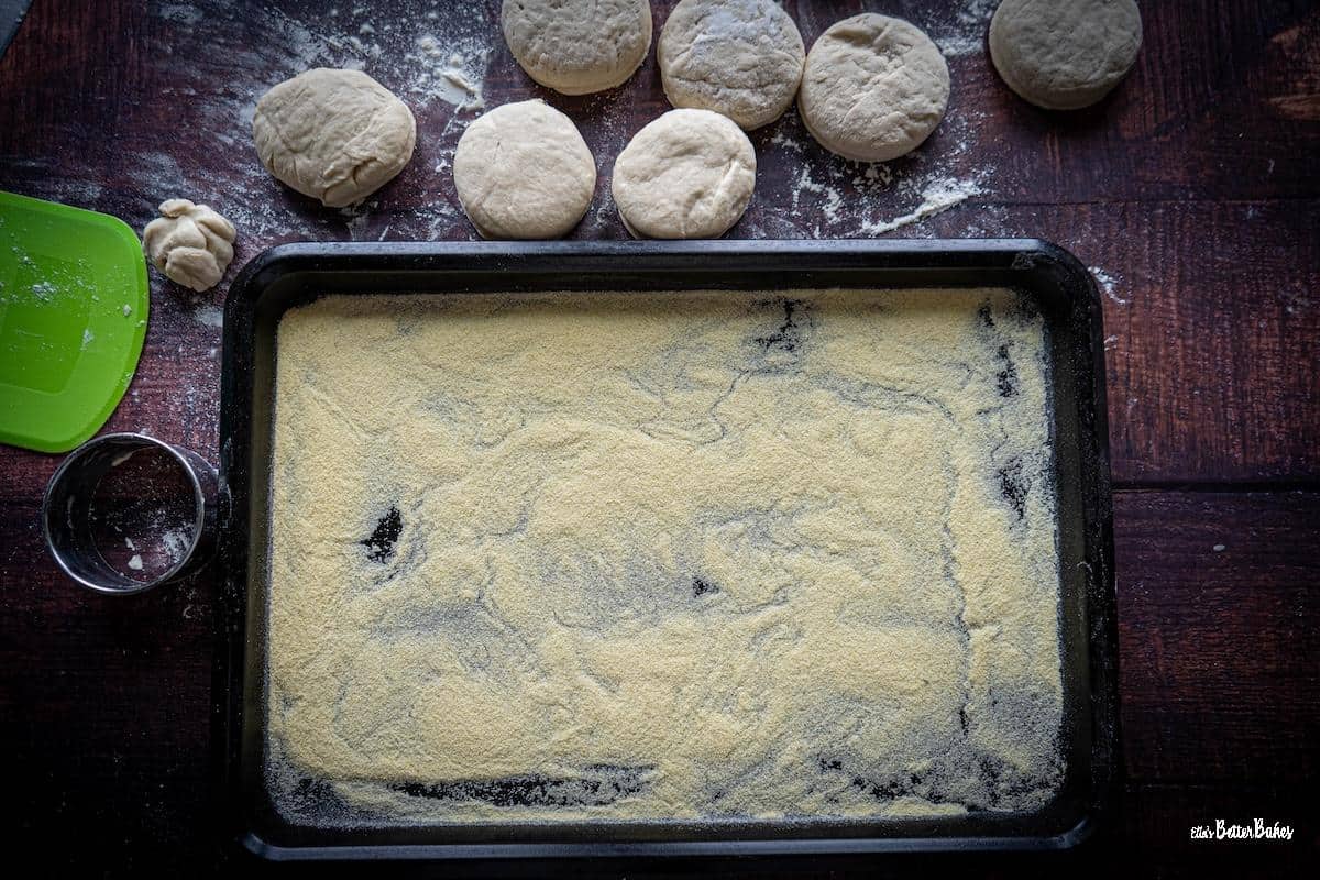 semolina added to a baking sheet
