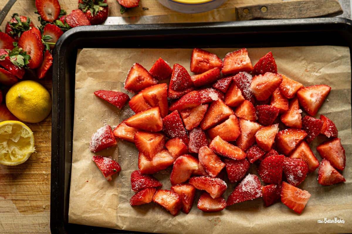 strawberries on a baking sheet ready to be roasted