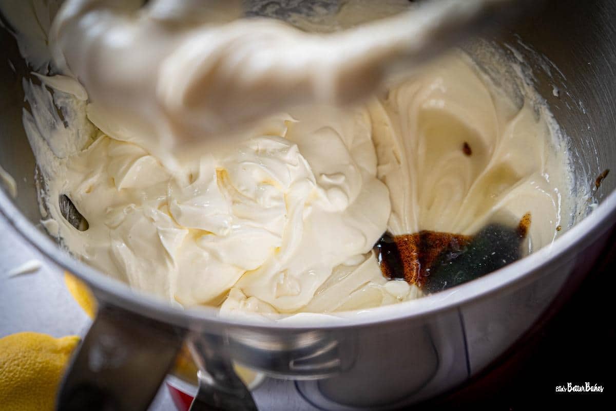vanilla extract, sour cream, creme fraiche added to beaten cream cheese and sugar