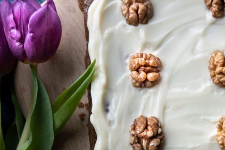 carrot cake with flower to side 